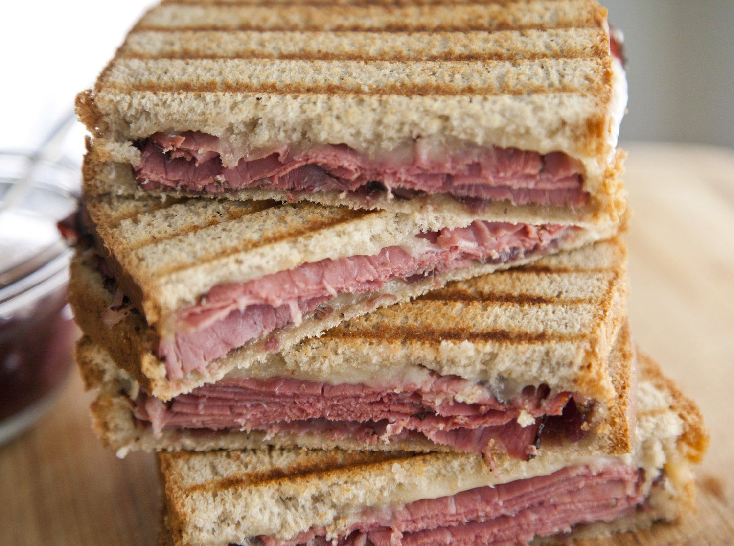 Pastrami, Swiss & Red Onion Jam Panini Sandwiches